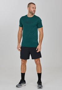 Endurance S/S PERFORMANCE - Sport T-shirt - bistro green