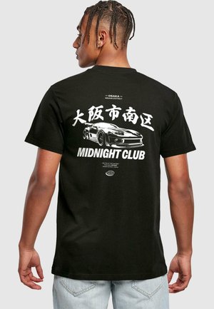 Black cotton t-shirt featuring a white graphic of a sports car and Japanese text. Short sleeves and standard fit with a round neckline.