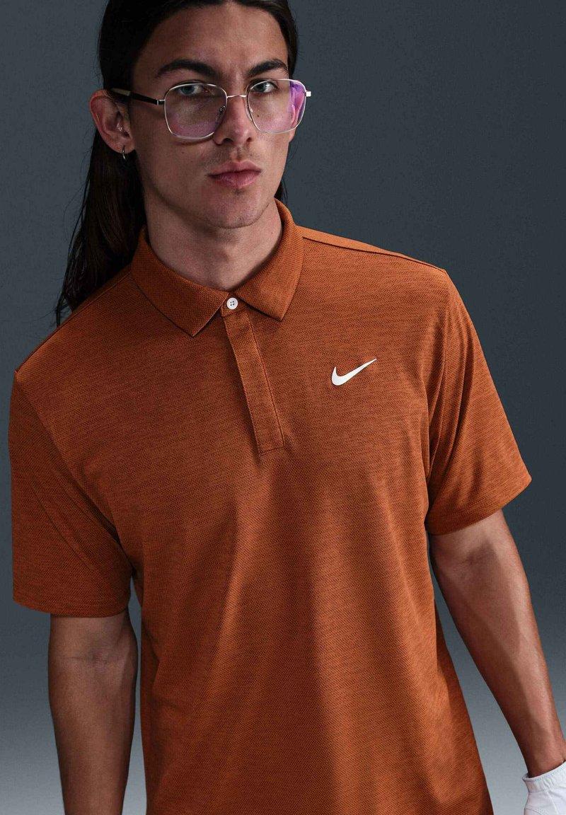 Nike Golf Poloshirt oranje
