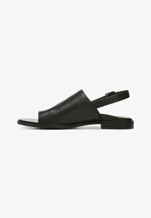Schwarze Leder-Slingback-Sandalen mit offenen Zehen, strukturiertem Obermaterial und flacher Sohle. Mit einem dünnen verstellbaren Riemen an der Ferse.