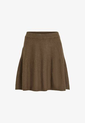 Pruun kohekootud seelik, millel on sobiv ribikujuline vöökoht, laienev kuju ja peen tekstuur. Pole nähtavaid mustreid ega aktsente.