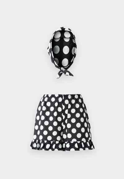 Schwarz-weiße Pünktchen-Shorts mit rüschengesäumtem Saum und passendem Kopftuch. Leichter Stoff mit elastischem Bund für zusätzlichen Komfort.