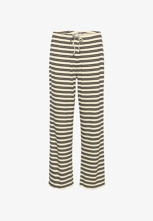 Mustritud mustad ja kreemikat tooni püksid, lõdva istuvusega, paelaga vöökohal ja vingerdavate äärtega sääreotsades. Pehme kangastekstuur.