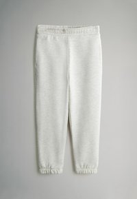 Lys grå sweatpants med elastisk talje og ankelsnøringer. Fremstillet af blødt, struktureret materiale med et subtilt meleret mønster.