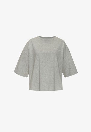 Gray oversized short-sleeve t-shirt, made of soft fabric, featuring a minimal logo "CPH STUDIO" printed on the left chest area.