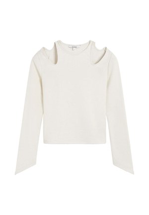 Top de manga larga en color crema con cortes en los hombros, dobladillo recto y tejido texturizado. Diseño sencillo sin patrones visibles ni herrajes.