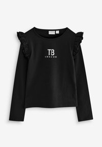 Melnas garām piedurknēm blūze ar volāniem uz pleciem un baltu "TB LONDON" logotipu. Izgatavota no mīksta materiāla, ar noapaļotu kakla izgriezumu.