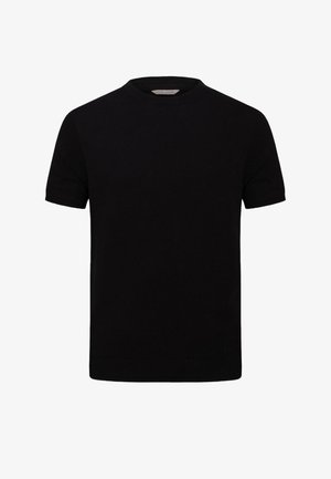 Top de punto negro de manga corta con cuello redondo y ribete acanalado en el dobladillo y los puños, etiqueta en el interior del cuello que dice "DAN JOHN."