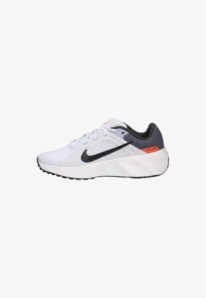 White athletic shoe with a textured mesh upper, black accents, a black swoosh logo, and orange detailing on the heel, featuring a thick rubber sole.