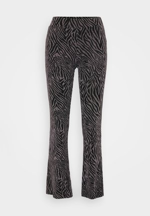 Mustade mustritega laiad püksid, millel on seepiateemaline disain, pehme tekstuur ja mugav elastne vöökoht.