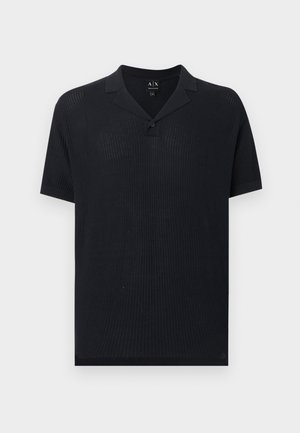 Black short-sleeve polo shirt with knit texture, single button placket, and small collar, shown on a light gray background.