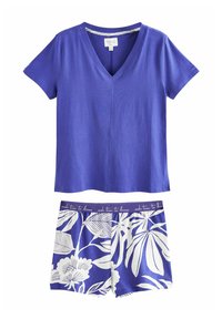 Purple cotton t-shirt with a V-neck and short sleeves, paired with blue shorts featuring white floral patterns and decorative waistband text.