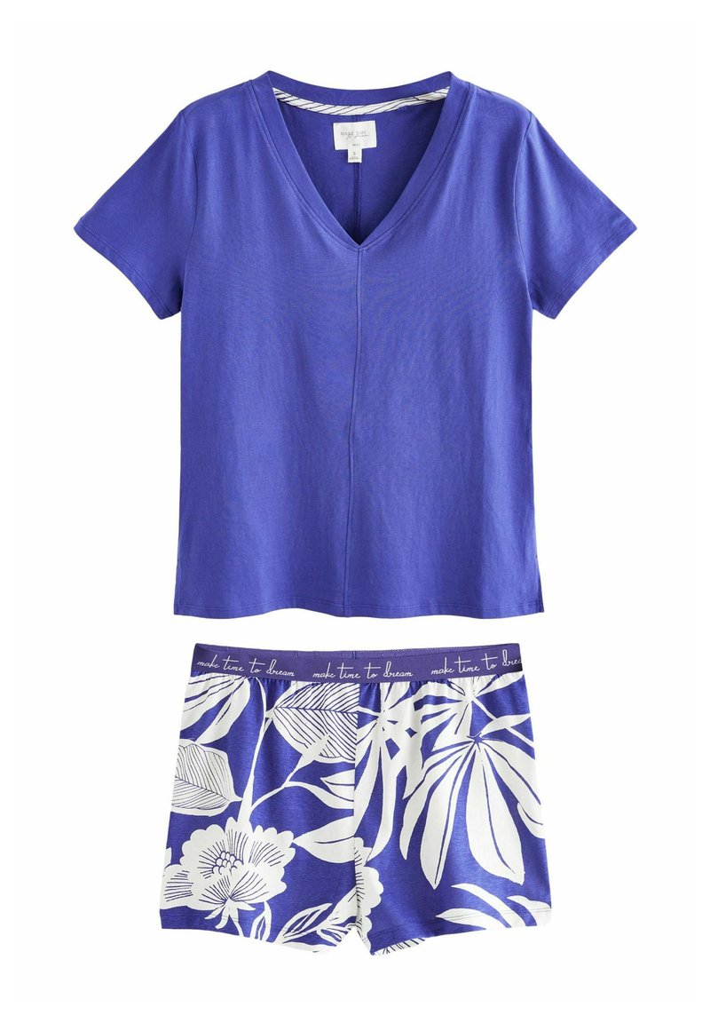 Purple cotton t-shirt with a V-neck and short sleeves, paired with blue shorts featuring white floral patterns and decorative waistband text.