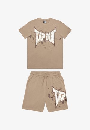 Beige cotton t-shirt and shorts set featuring a large "TAPOUT" logo with splatter design in white and brown accents. Elastic waistband on shorts.