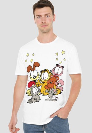 White cotton t-shirt featuring cartoon characters, including a gray cat, yellow dog, and pink bear, with stars in the background.