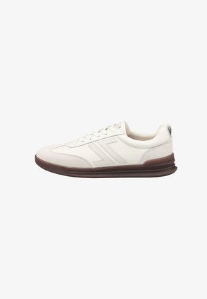 White leather sneaker with suede accents, rubber sole, and a textured brown outsole. Features flat laces and logo detail on the side.