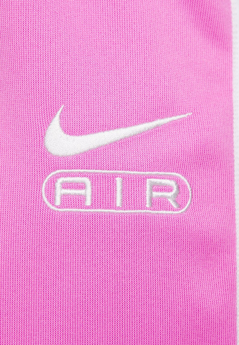 Pantalon survêtement Atlético Madrid Strike bleu rose 2024/25 sur
