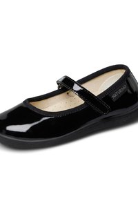 Scarpa Mary Jane in vernice nera con una sola fascia e soletta imbottita beige, con etichetta del marchio Naturino.