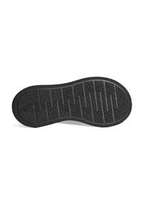 Zwarte rubberen zool met een gestructureerd oppervlak, voorzien van horizontale en verticale groeven voor grip en flexibiliteit.