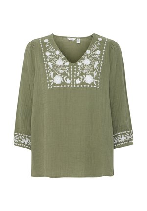 Grünes, leichtes Blusenshirt mit 3/4-Ärmeln, V-Ausschnitt und weißer Blumenstickerei am Ausschnitt und den Ärmeln. Strukturierter Stoff.