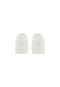 Sneakers bianchi con materiale sintetico liscio, forma arrotondata, colletto imbottito e motivi del battistrada della suola sottili.