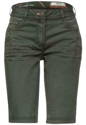 Shorts verts foncés longueur genou avec double bouton sur le devant, passants pour ceinture et poches latérales, avec les étiquettes « Soul of Sunshine » et « Cecil » à l'intérieur.