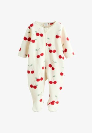Kombinezon z polaru w kolorze kremowym z nadrukiem czerwonych wiśni. Długie rękawy, zamek z przodu i nogawki zakrywające stopy dla ciepła. Miękka tekstura z zielonymi akcentami w liści.