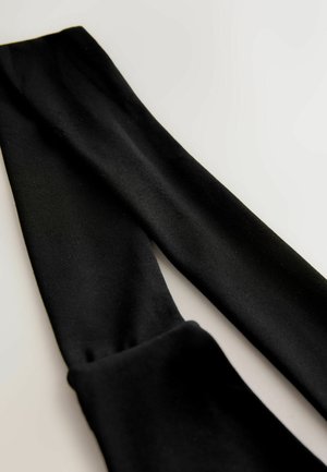 Schwarze Leggings aus glattem Stretchmaterial mit einer klassischen Passform. Dicke besitzt einen nahtlosen Bund und keine sichtbaren Muster oder Hardware.