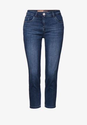 Tummansiniset farkut, joissa on slim fit -leikkaus, edessä taskut, nappisuljenta ja sileä pinta. Klassinen viiden taskun muotoilu.