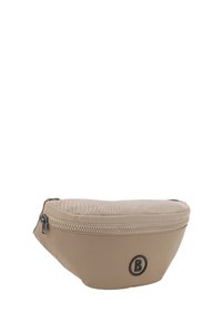 Marsupio beige realizzato in materiale sintetico liscio. Caratterizzato da una chiusura con zip e un accento a forma di logo rotondo sul fronte. Forma compatta e curvada.