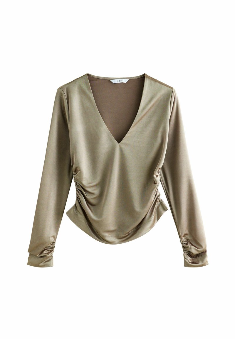 Khašijasta longsleeve majica s dubokim V-izrezom, nabranu stranu i skupljene manžete. Izrađena od glatkog, mekog materijala.