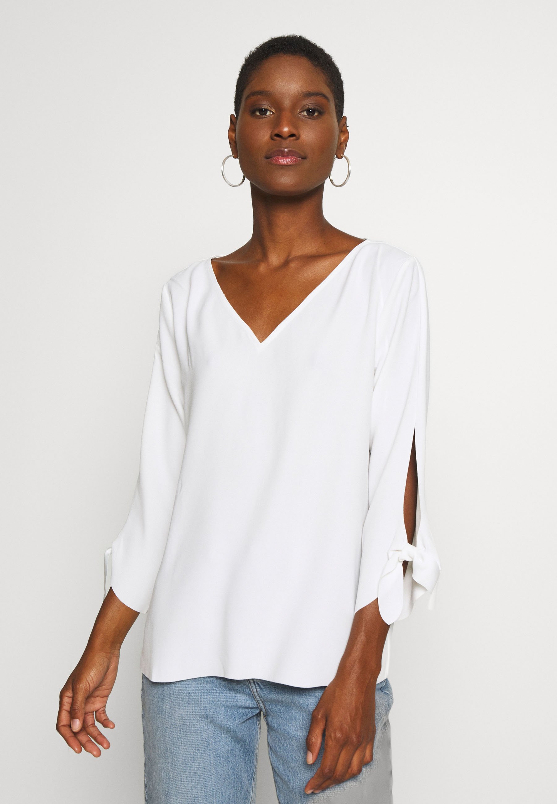 Esprit Collection MATT SHINY Blusa - offwhite/crema - Zalando.es