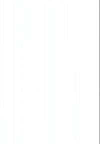 Three diverse women sitting around a table, working together and smiling, with a tablet and papers in a bright office.