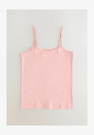 Roze katoenen spaghettitop met dunne bandjes, voorzien van een verfijnde bloemenprint en een klein strikdetail op de halslijn. Zachte, lichte stof.