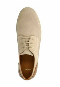 Beige lace-up shoe with a textured upper and smooth leather accents. Rounded toe and brown interior lining. Brand name "Manfield" visible.