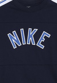 Nike Performance Camiseta estampada - dark blue