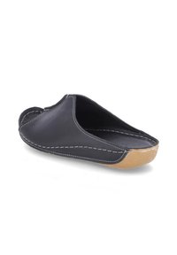 Schwarzer Leder-Slipper zum Hineinschlüpfen mit sichtbaren weißen Nähten und einer hellbraunen Gummisohle, für Behaglichkeit im Innenbereich entworfen.