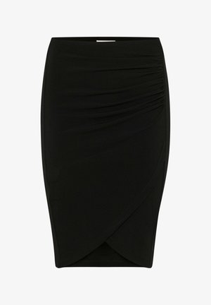 Mustmust särgid mustalt värvilt, millel on ühel küljel kortsunud tekstuur ja sange väljalõige. Omab sujuvat tekstuuri ja peent metallist aktsenti vööosas.