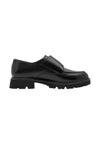 Μαύρο δερμάτινο παπούτσι τύπου slip-on με παχιά σόλα και φαρδιά λουρίδα στο πάνω μέρος, εμφανίζεται σε πλευρικό προφίλ σε λευκό φόντο.