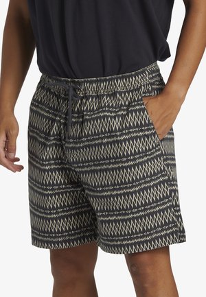 Herrbadbyxor i geometriskt mönster, med en mörk basfärg och krämfärgade detaljer, elastisk midja och sidofickor.