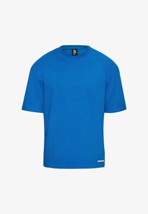 Blue cotton t-shirt with short sleeves, crew neck design, and a small logo accent on the side near the hem. Smooth texture.