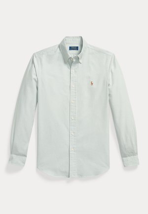Camicia azzurra chiara a maniche lunghe con colletto abbottonato e piccolo logo ricamato sul petto sinistro.