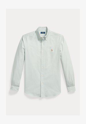 Camicia azzurra chiara a maniche lunghe con colletto abbottonato e piccolo logo ricamato sul petto sinistro.