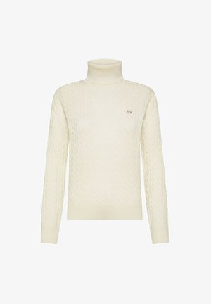 Maglione a collo alto a trecce crema con maniche lunghe, dotato di un piccolo logo sul petto. Realizzato in tessuto morbido e testurizzato.