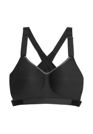 Soutien-gorge de sport noir en tissu texturé, avec des bretelles ajustables croisées et une bande douce. Présente des accents gris autour de l'encolure et des bretelles.
