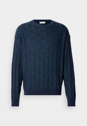 Maglione lavorato a maglia blu navy con un motivo a diamante diagonale e orli a costine. Realizzato in materiale morbido per comfort e calore.