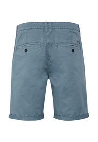 Light blue cotton shorts with a smooth texture, cuffed hems, two back pockets with black buttons, and a belt loop waistband.