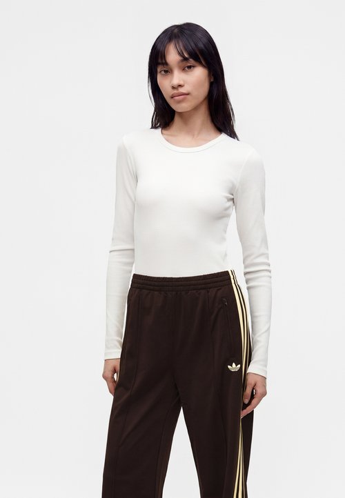 adidas FIREBIRD LOOSE - Tracksuit bottoms - aurora coffee/almost yellow — photo 4