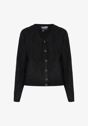 Cárdigan negro con manchas blancas, textura acanalada en la parte delantera, botones decorativos y mangas largas. Tejido de punto suave, cuello redondo.