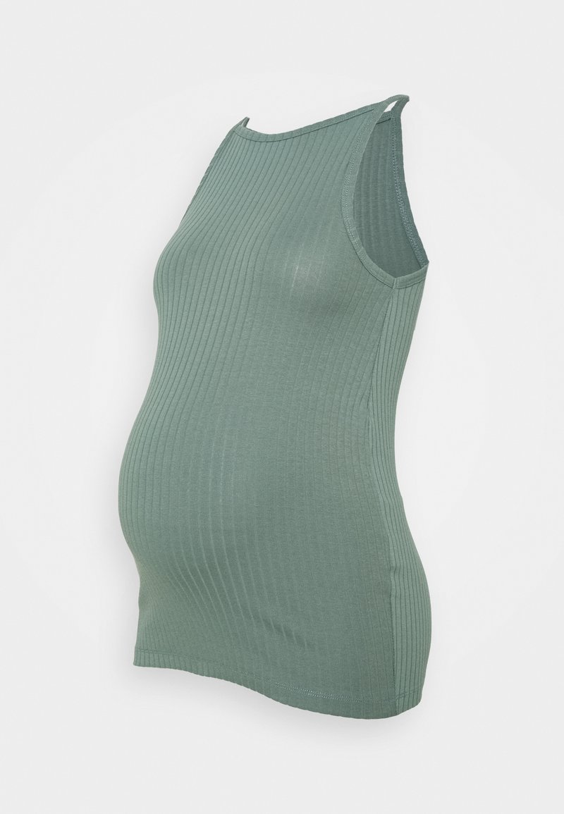 Débardeur de maternité sans manches en tissu côtelé vert doux avec tissu extensible conçu pour un ventre de femme enceinte.